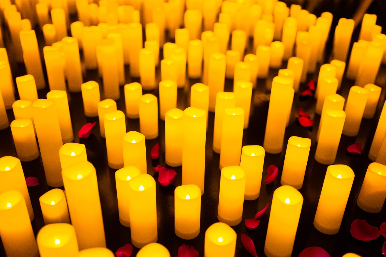 Glowing candles at a Candlelight concert